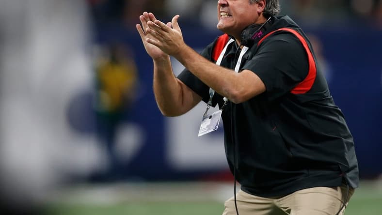 Georgia offensive line coach Matt Luke on the sideline during the first half of the Southeastern Conference championship NCAA college football game between Georgia and Alabama in Atlanta, on Saturday, Dec. 4, 2021.

News Joshua L Jones