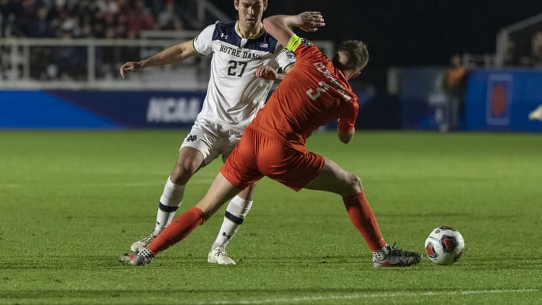 Dec 10, 2021; Cary, NC, USA; Clemson defender Oskar   gren (3) tries to deflect the dribble from Notre Dame forward Jack Lynn (27) during the second half of the NCAA College Cup semifinal game at WakeMed Soccer Park. Mandatory Credit: William Howard-USA TODAY Sports