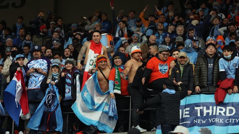 Dec 11, 2021; Portland, OR, USA; Fans of of the New York City FC celebrate after defeating the Portland Timbers in the 2021 MLS Cup championship game at Providence Park. Mandatory Credit: Jaime Valdez-USA TODAY Sports