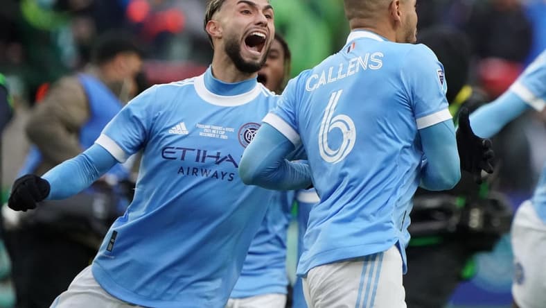 Dec 11, 2021; Portland, OR, USA; New York City FC defender Alexander Callens (6) celebrates with midfielder Valentin Castellanos (left) after defeating the Portland Timbers in the 2021 MLS Cup championship game at Providence Park. Mandatory Credit: John David Mercer-USA TODAY Sports