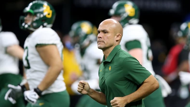 Jan 1, 2022; New Orleans, LA, USA; Baylor Bears head coach Dave Aranda runs onto the field before the 2022 Sugar Bowl against the Mississippi Rebels at the Caesars Superdome. Mandatory Credit: Chuck Cook-USA TODAY Sports