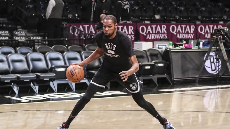 Jan 13, 2022; Brooklyn, New York, USA; Brooklyn Nets forward Kevin Durant (7) takes warmups prior to the game against the Oklahoma City Thunder at Barclays Center. Mandatory Credit: Wendell Cruz-USA TODAY Sports