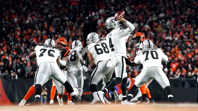 Las Vegas Raiders quarterback Derek Carr (4) throws from the pocket in the third quarter during an NFL AFC wild-card playoff game against the Cincinnati Bengals, Saturday, Jan. 15, 2022, at Paul Brown Stadium in Cincinnati. The Cincinnati Bengals defeated the Las Vegas Raiders, 26-19 to win the franchise's first playoff game in 30 years.
Las Vegas Raiders At Cincinnati Bengals Jan 15 Afc Wild Card Game