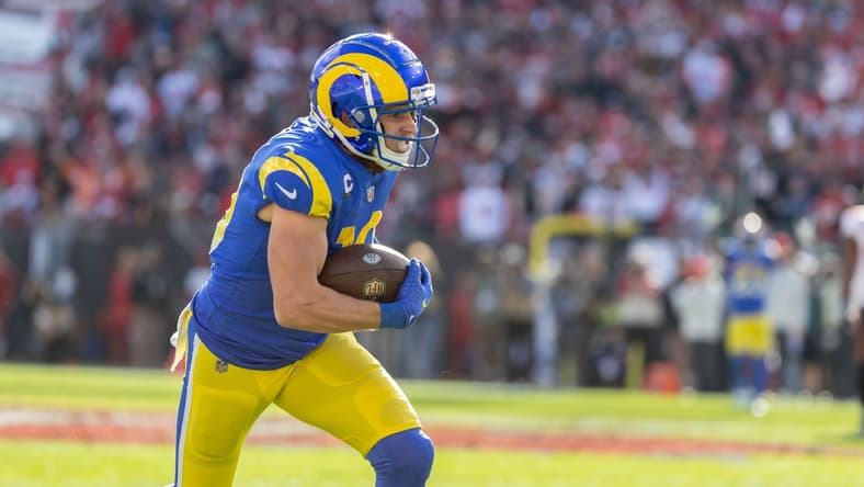 Jan 23, 2022; Tampa, Florida, USA; Los Angeles Rams wide receiver Cooper Kupp (10) runs with the ball during the first half against the Tampa Bay Buccaneers during a NFC Divisional playoff football game at Raymond James Stadium. Mandatory Credit: Matt Pendleton-USA TODAY Sports