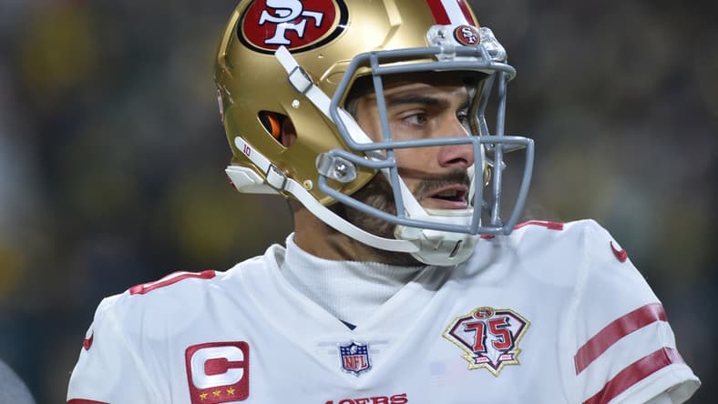 Jan 22, 2022; Green Bay, Wisconsin, USA; San Francisco 49ers quarterback Jimmy Garoppolo (10) in action against the Green Bay Packers during a NFC Divisional playoff football game at Lambeau Field. Mandatory Credit: Jeffrey Becker-USA TODAY Sports