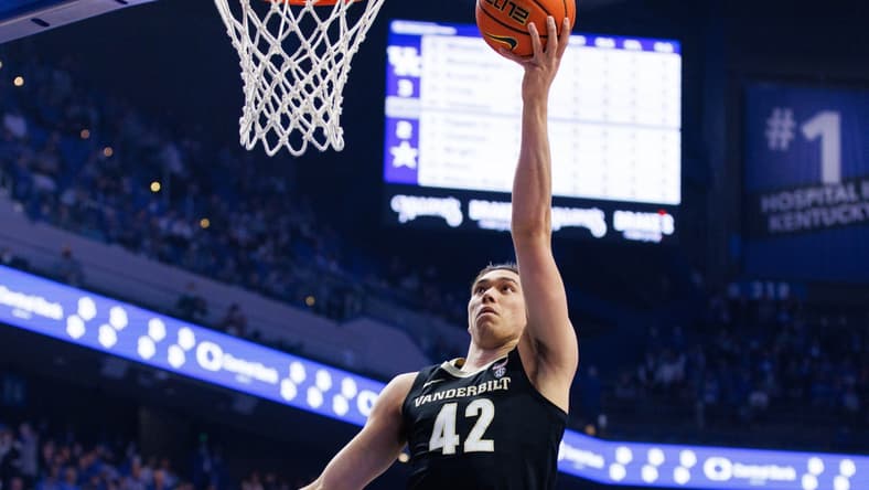 Feb 2, 2022; Lexington, Kentucky, USA; Vanderbilt Commodores forward Quentin Millora-Brown (42) goes to the basket during the first half against the Kentucky Wildcats at Rupp Arena at Central Bank Center. Mandatory Credit: Jordan Prather-USA TODAY Sports