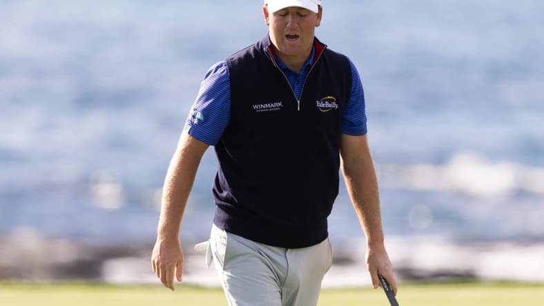 Feb 3, 2022; Pebble Beach, California, USA; Tom Hoge reacts after missing a birdie put on his final hole in the first round of the AT&T Pebble Beach Pro-Am golf tournament at Pebble Beach Golf Links. Mandatory Credit: Bill Streicher-USA TODAY Sports