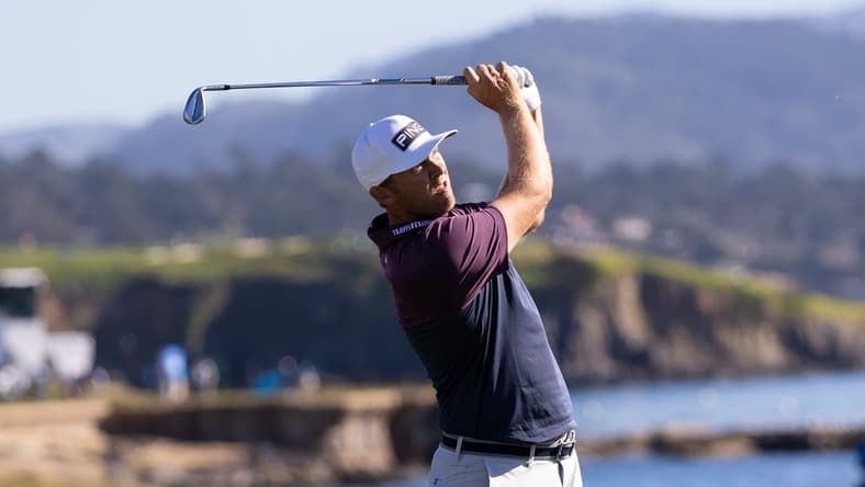 Feb 4, 2022; Pebble Beach, California, USA; Seamus Power plays his approach shot on the eighteenth hole during the second round of the AT&T Pebble Beach Pro-Am golf tournament at Pebble Beach Golf Links. Mandatory Credit: Bill Streicher-USA TODAY Sports