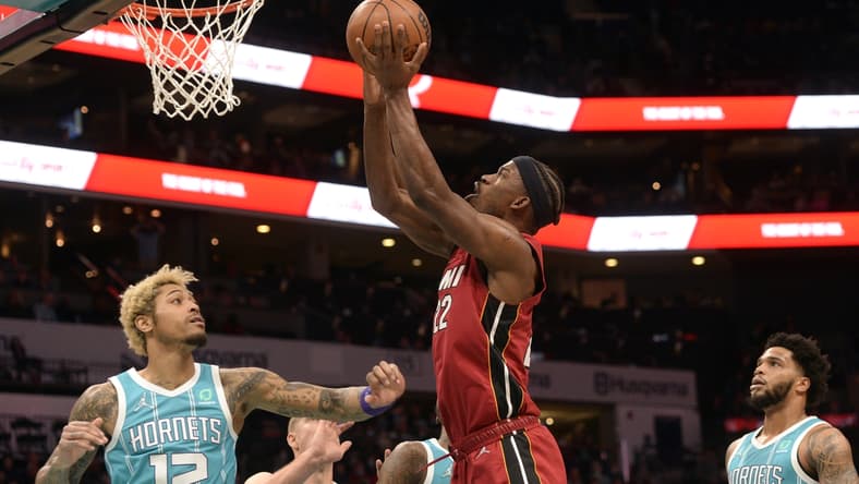 Feb 5, 2022; Charlotte, North Carolina, USA; Miami Heat forward Jimmy Butler (22) scores against the Charlotte Hornets during the first half at the Spectrum Center. Mandatory Credit: Sam Sharpe-USA TODAY Sports