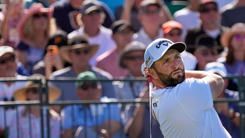 Feb 10, 2022; Scottsdale, AZ, USA;  Jon Rahm hits from the 1st tee box during Round 1 of the WM Phoenix Open at TPC Scottsdale. Mandatory Credit: Cheryl Evans-Arizona Republic

Golf Wm Phoenix Open Day 1