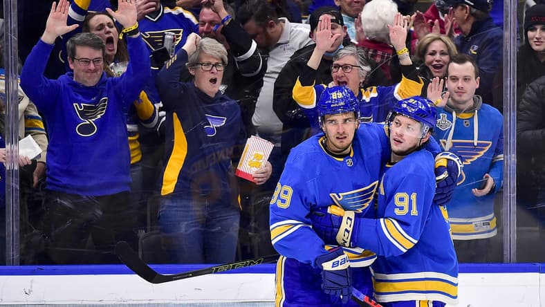 Feb 12, 2022; St. Louis, Missouri, USA;  St. Louis Blues right wing Vladimir Tarasenko (91) celebrates with left wing Pavel Buchnevich (89) after scoring against the Chicago Blackhawks during the second period at Enterprise Center. Mandatory Credit: Jeff Curry-USA TODAY Sports