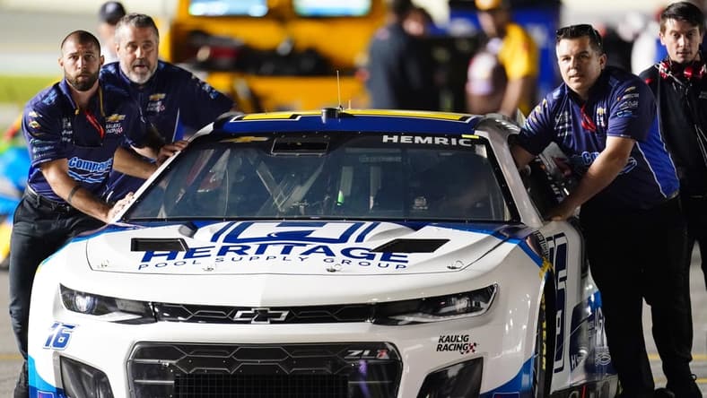 Feb 16, 2022; Daytona, FL, USA; NASCAR Cup Series driver Daniel Hemric (16) crew pushes his car down pit road during qualifying for the Daytona 500 at Daytona International Speedway. Mandatory Credit: John David Mercer-USA TODAY Sports