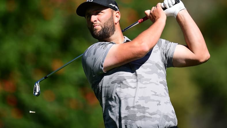 Feb 17, 2022; Pacific Palisades, California, USA; Jon Rahm hits from the fourth tee during the first round of the Genesis Invitational golf tournament. Mandatory Credit: Gary A. Vasquez-USA TODAY Sports