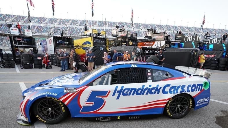 Feb 18, 2022; Daytona Beach, Florida, USA; NASCAR Cup Series driver Kyle Larson (5) leaves the garage area during practice for the Daytona 500 at Daytona International Speedway. Mandatory Credit: John David Mercer-USA TODAY Sports