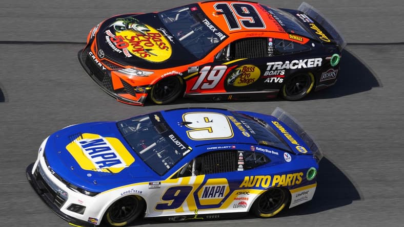 Feb 20, 2022; Daytona Beach, Florida, USA; NASCAR Cup Series driver Martin Truex Jr. (19) and driver Chase Elliott (9) race side by side during the Daytona 500 at Daytona International Speedway. Mandatory Credit: Mike Dinovo-USA TODAY Sports