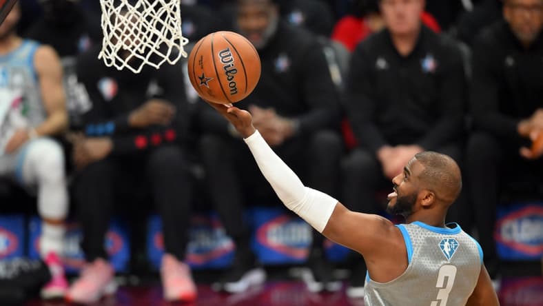 Feb 20, 2022; Cleveland, Ohio, USA; Team LeBron guard Chris Paul (3) shoots against Team Durant in the first quarter during the 2022 NBA All-Star Game at Rocket Mortgage FieldHouse. Mandatory Credit: David Richard-USA TODAY Sports