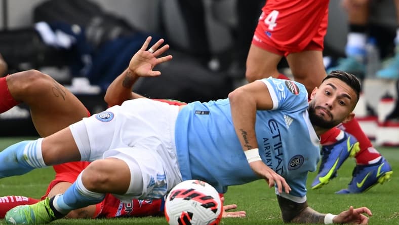 Feb 23, 2022; Los Angeles, CA, USA; New York City midfielder Valentin Castellanos (11) and Santos de Guapiles defender Everardo Rubio (21) battle for the ball in the second half at Banc of California Stadium. Mandatory Credit: Jayne Kamin-Oncea-USA TODAY Sports