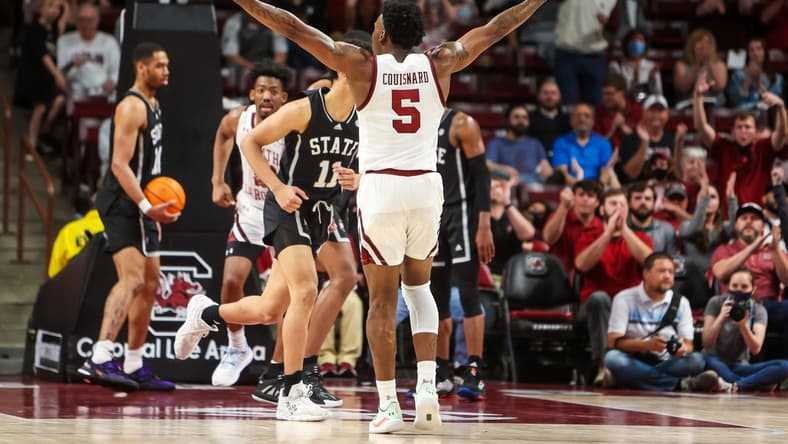 Feb 23, 2022; Columbia, South Carolina, USA; South Carolina Gamecocks guard Jermaine Couisnard (5) celebrates a play against the Mississippi State Bulldogs in the second half at Colonial Life Arena. Mandatory Credit: Jeff Blake-USA TODAY Sports