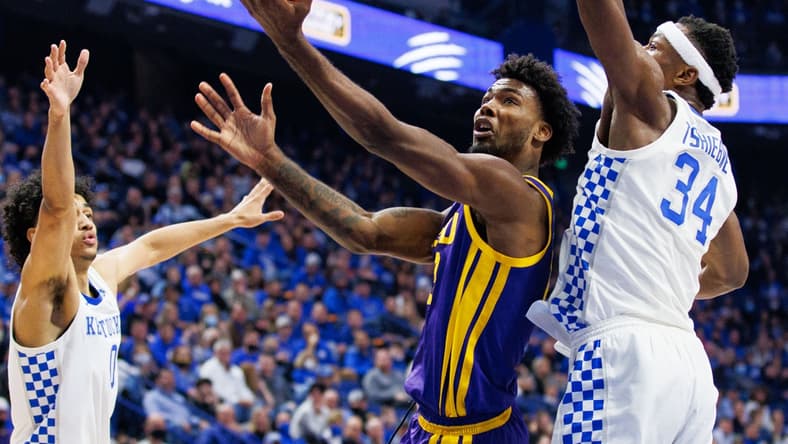 Feb 23, 2022; Lexington, Kentucky, USA; LSU Tigers forward Tari Eason (13) goes to the basket during the first half against the Kentucky Wildcats at Rupp Arena at Central Bank Center. Mandatory Credit: Jordan Prather-USA TODAY Sports