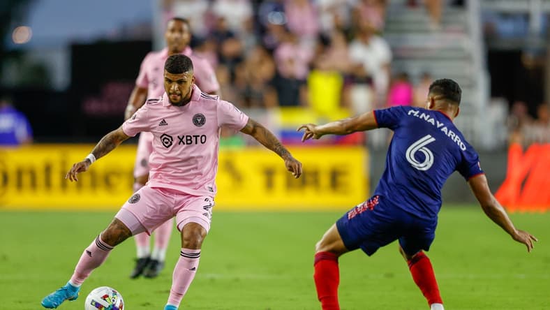 Feb 26, 2022; Fort Lauderdale, Florida, USA; Inter Miami defender DeAndre Yedlin (2) looks to pass the ball defended by Chicago Fire defender Miguel Angel Navarro (6) in the first half at Inter Miami CF Stadium. Mandatory Credit: Nathan Ray Seebeck-USA TODAY Sports