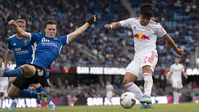 February 26, 2022; San Jose, California, USA; New York Red Bulls midfielder Omir Fernandez (21) scores a goal against the San Jose Earthquakes during the second half at PayPal Park. Mandatory Credit: Kyle Terada-USA TODAY Sports