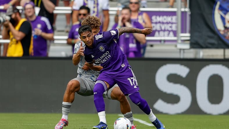 Feb 27, 2022; Orlando, Florida, USA; Orlando City midfielder Facundo Torres (17) keeps possession during a match against CF Montr al mat Orlando City Stadium. Mandatory Credit: Nathan Ray Seebeck-USA TODAY Sports