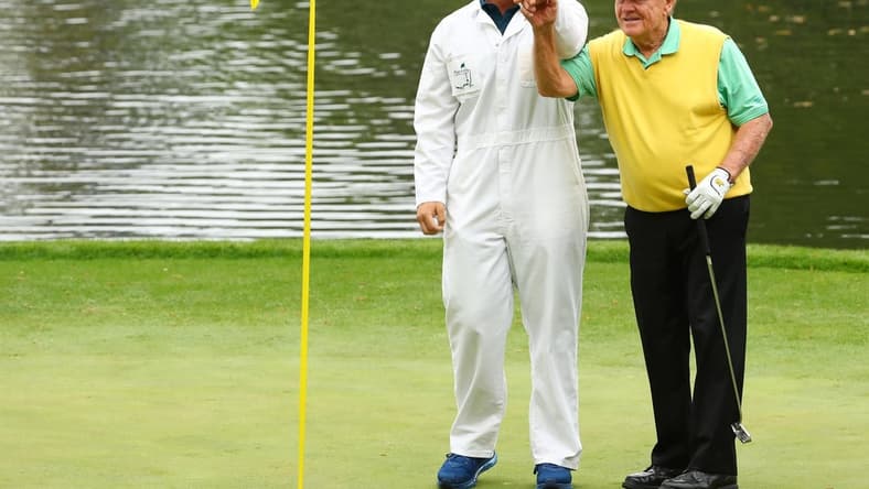 Apr 4, 2018; Augusta, GA, USA; Gary Nicklaus, Jr. the grandson of Jack Nicklaus holds up the ball after making a hole-in-one on the 9th hole during the Par 3 Contest before the Masters golf tournament at Augusta National Golf Club. Mandatory Credit: Rob Schumacher-USA TODAY Sports