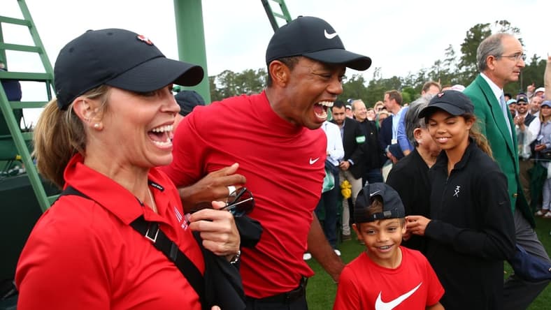 Apr 14, 2019; Augusta, GA, USA; Tiger Woods celebrates with daughter Sam and son Charlie after winning The Masters golf tournament at Augusta National Golf Club. Mandatory Credit: Rob Schumacher-USA TODAY Sports