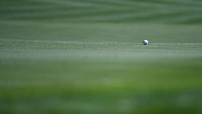 Mar 12, 2020; Ponte Vedra Beach, Florida, USA; A general view of a golf ball on the 18th hole during the first round of the 2020 edition of The Players Championship golf tournament at TPC Sawgrass - Stadium Course. Mandatory Credit: Adam Hagy-USA TODAY Sports