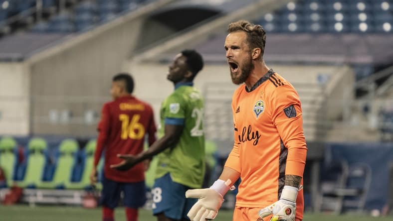 Oct 7, 2020; Seattle, Washington, USA; Seattle Sounders FC goalkeeper Stefan Frei (24) reacts to a call during the second half of a match against Real Salt Lake at CenturyLink Field. Mandatory Credit: Stephen Brashear-USA TODAY Sports