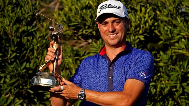 Mar 14, 2021; Ponte Vedra Beach, Florida, USA; Justin Thomas celebrates with the trophy after winning The Players Championship golf tournament at TPC Sawgrass - Stadium Course. Mandatory Credit: Jasen Vinlove-USA TODAY Sports