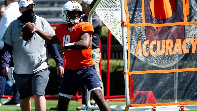 Auburn quarterback Dematrius Davis (18) runs drills during an open football practice at Jordan-Hare Stadium in Auburn, Ala., on Saturday, March 20, 2021.