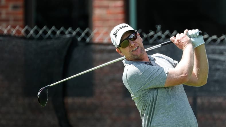 Ryan Brehm tees off on the eighth hole during the second round of the Rocket Mortgage Classic at the Detroit Golf Club in Detroit on Friday, July 2, 2021.
