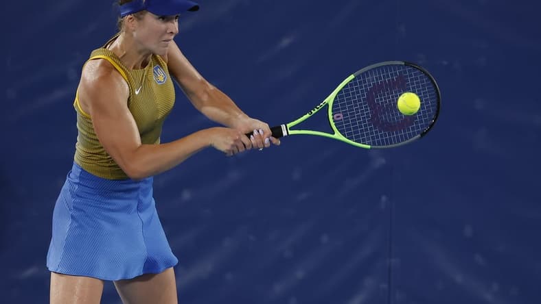 Jul 29, 2021; Tokyo, Japan; Elina Svitolina of Ukraine hits a backhand against Marketa Vondrousova of Czech Republic (not pictured) in a women's singles semifinal during the Tokyo 2020 Olympic Summer Games at Ariake Tennis Park. Mandatory Credit: Geoff Burke-USA TODAY Sports