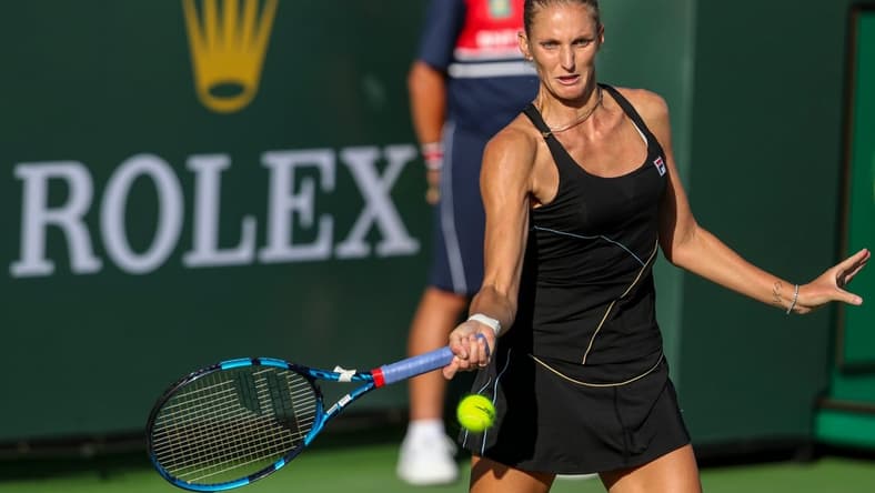 Karolina Pliskova of Czechia returns the ball to Beatriz Haddad Maia of Brazil during their round three match of the BNP Paribas Open, Monday, Oct. 11, 2021, in Indian Wells, Calif.