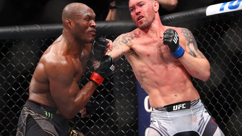 Nov 6, 2021; New York, NY, USA; Kamaru Usman (red gloves) competes against Colby Covington (blue gloves) during UFC 268 at Madison Square Garden. Mandatory Credit: Ed Mulholland-USA TODAY Sports