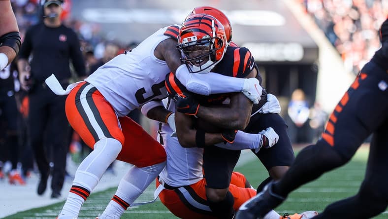 Nov 7, 2021; Cincinnati, Ohio, USA; Cleveland Browns linebacker Mack Wilson (51) tackles Cincinnati Bengals wide receiver Ja'Marr Chase (1) in the first half at Paul Brown Stadium. Mandatory Credit: Katie Stratman-USA TODAY Sports