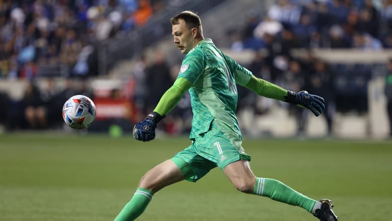 Nov 28, 2021; Philadelphia, Pennsylvania, USA; Nashville SC goalkeeper Joe Willis (1) clears the ball against the Philadelphia Union in the conference semifinals of the 2021 MLS playoffs at Subaru Park. Mandatory Credit: Bill Streicher-USA TODAY Sports