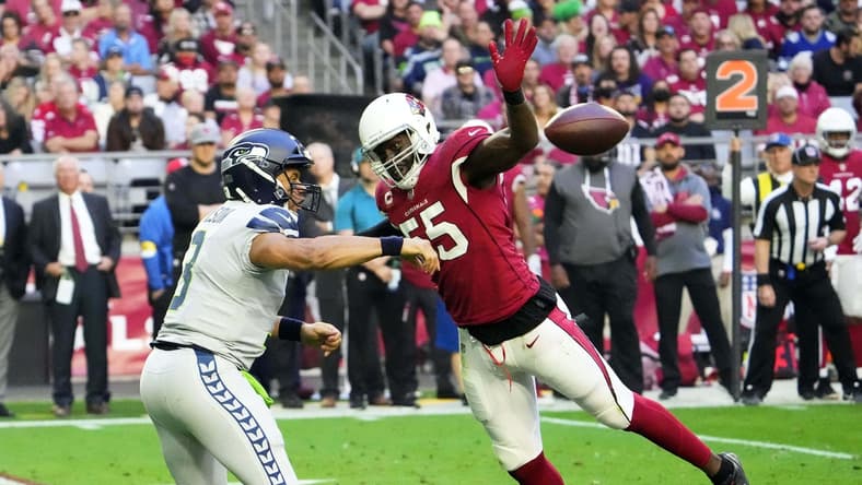 Jan 9, 2022; Glendale, Arizona, USA; Arizona Cardinals outside linebacker Chandler Jones (55) pressures the pass by Seattle Seahawks quarterback Russell Wilson (3) in the first half at State Farm Stadium. Mandatory Credit: Rob Schumacher-Arizona Republic
Nfl Seattle Seahawks At Arizona Cardinals