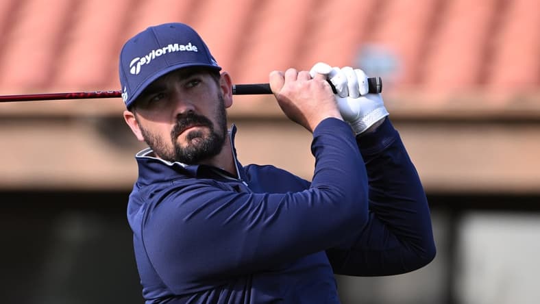 Jan 22, 2022; La Quinta, California, USA; Chad Ramey watches his shot from the 10th tee during the third round of the American Express golf tournament at La Quinta Country Club. Mandatory Credit: Orlando Ramirez-USA TODAY Sports