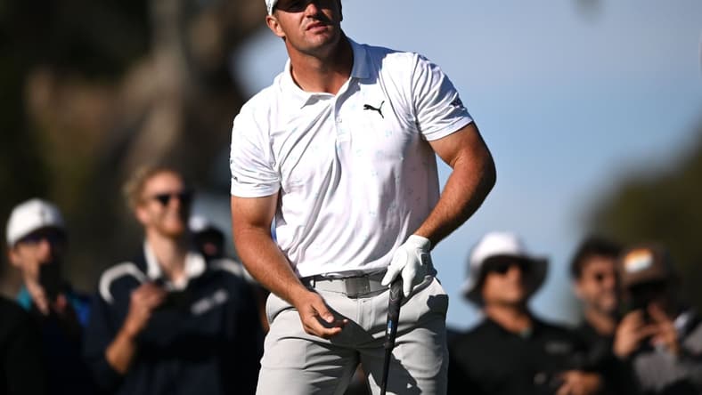 Jan 27, 2022; San Diego, California, USA; Bryson DeChambeau watches his shot from the ninth tee during the first round of the Farmers Insurance Open golf tournament at Torrey Pines Municipal Golf Course - North Course. Mandatory Credit: Orlando Ramirez-USA TODAY Sports