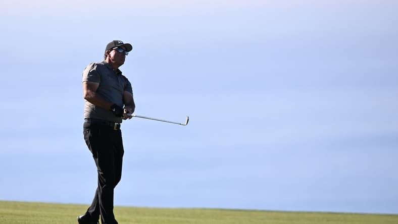 Jan 27, 2022; San Diego, California, USA; Phil Mickelson plays his second shot on the fourth hole during the first round of the Farmers Insurance Open golf tournament at Torrey Pines Municipal Golf Course - South Course. Mandatory Credit: Orlando Ramirez-USA TODAY Sports
