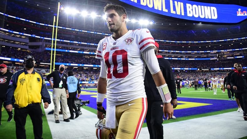 Jan 30, 2022; Inglewood, California, USA; San Francisco 49ers quarterback Jimmy Garoppolo leaves the field after losing to the Los Angeles Rams in the NFC Championship Game at SoFi Stadium. Mandatory Credit: Gary A. Vasquez-USA TODAY Sports