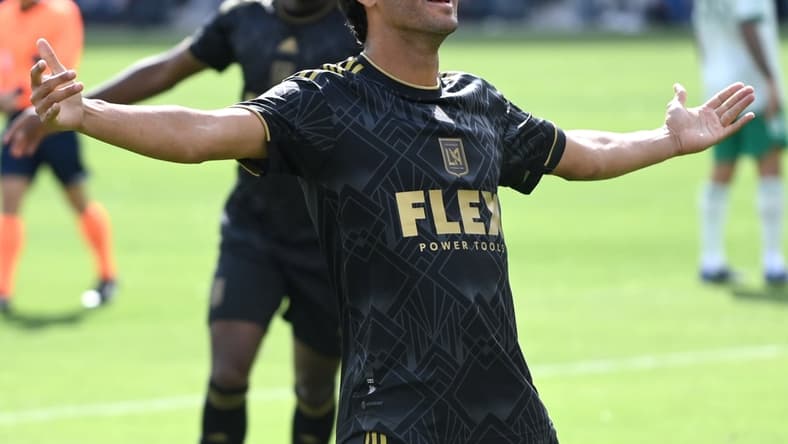 Feb 26, 2022; Los Angeles, California, USA;  Los Angeles FC forward Carlos Vela (10) celebrates with fans after scoring his third goal of the game against the Colorado Rapids at Banc of California Stadium. Mandatory Credit: Jayne Kamin-Oncea-USA TODAY Sports