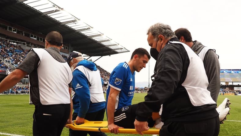 Feb 26, 2022; San Jose, California, USA; San Jose Earthquakes defender Nathan (13) is carried off the field during the first half against the New York Red Bulls at PayPal Park. Mandatory Credit: Kelley L Cox-USA TODAY Sports