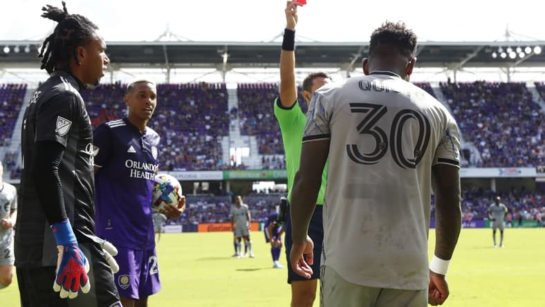 Feb 27, 2022; Orlando, Florida, USA; CF Montr al forward Romell Quioto (30) gets called for a red card as he shoves Orlando City SC defender Robin Jansson (6) (not pictured) during the second half at Orlando City Stadium. Mandatory Credit: Kim Klement-USA TODAY Sports