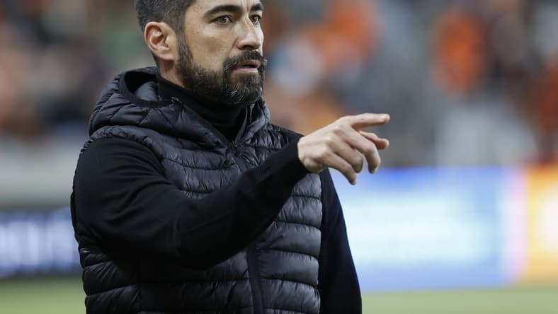 Feb 27, 2022; Houston, Texas, USA; Houston Dynamo FC head coach Paulo Nagamura reacts during the first half against the Real Salt Lake at PNC Stadium. Mandatory Credit: Troy Taormina-USA TODAY Sports