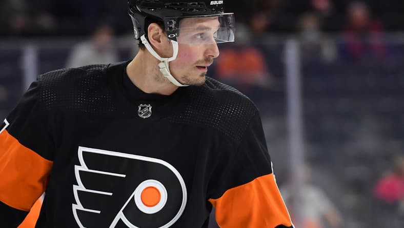 Feb 21, 2022; Philadelphia, Pennsylvania, USA; Philadelphia Flyers defenseman Justin Braun (61) against the Carolina Hurricanes at Wells Fargo Center. Mandatory Credit: Eric Hartline-USA TODAY Sports