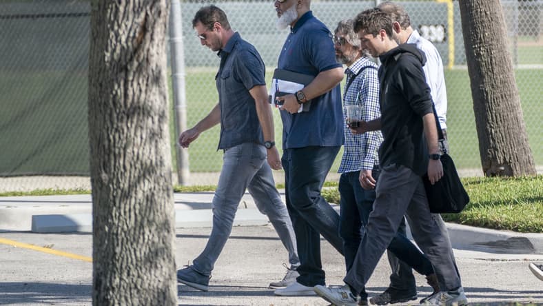Feb 28, 2022; Jupiter, FL, USA; New York Mets pitcher Max Scherzer, far left, Major League Baseball Players Association executive director Tony Clark, second from left, arrive for negotiations with the players union in an attempt to reach an agreement to salvage March 31 openers and a 162-game season, Feb. 28, 2022, at Roger Dean Stadium in Jupiter, Florida. Mandatory Credit: Greg Lovett-USA TODAY NETWORK
