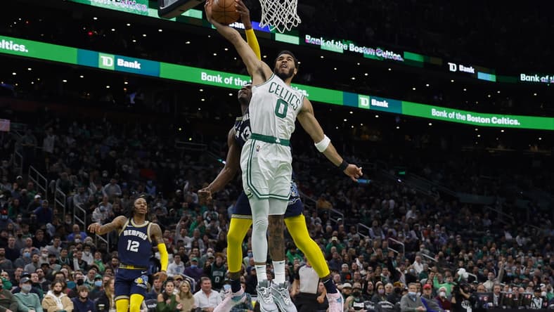 Mar 3, 2022; Boston, Massachusetts, USA; Memphis Grizzlies forward Jaren Jackson Jr. (13) blocks a shot attempt by Boston Celtics forward Jayson Tatum (0) during the first quarter at TD Garden. Mandatory Credit: Winslow Townson-USA TODAY Sports